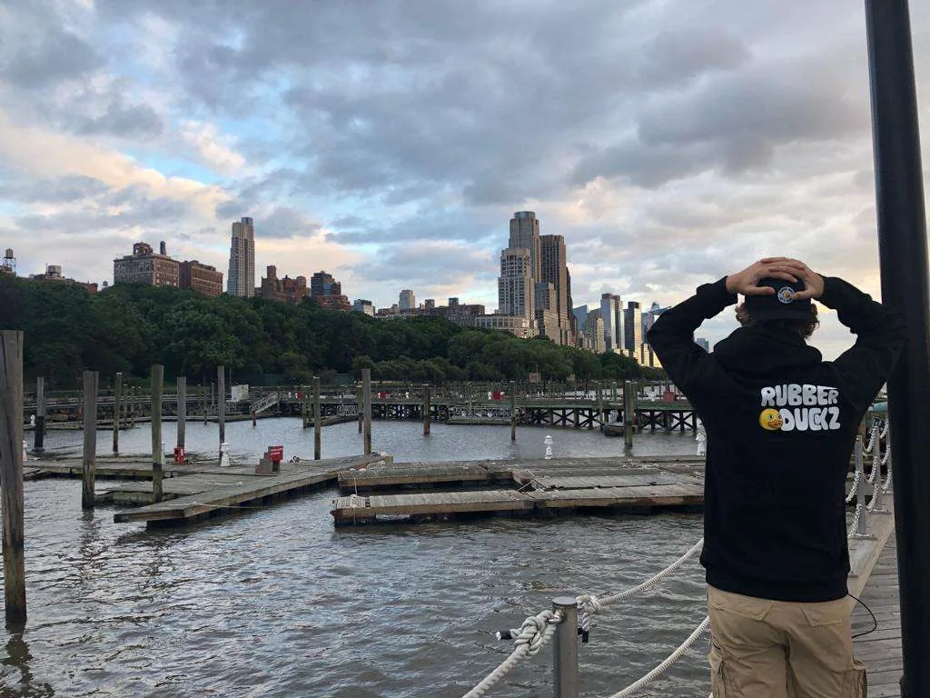 The Genesis hoodie by the harbor
